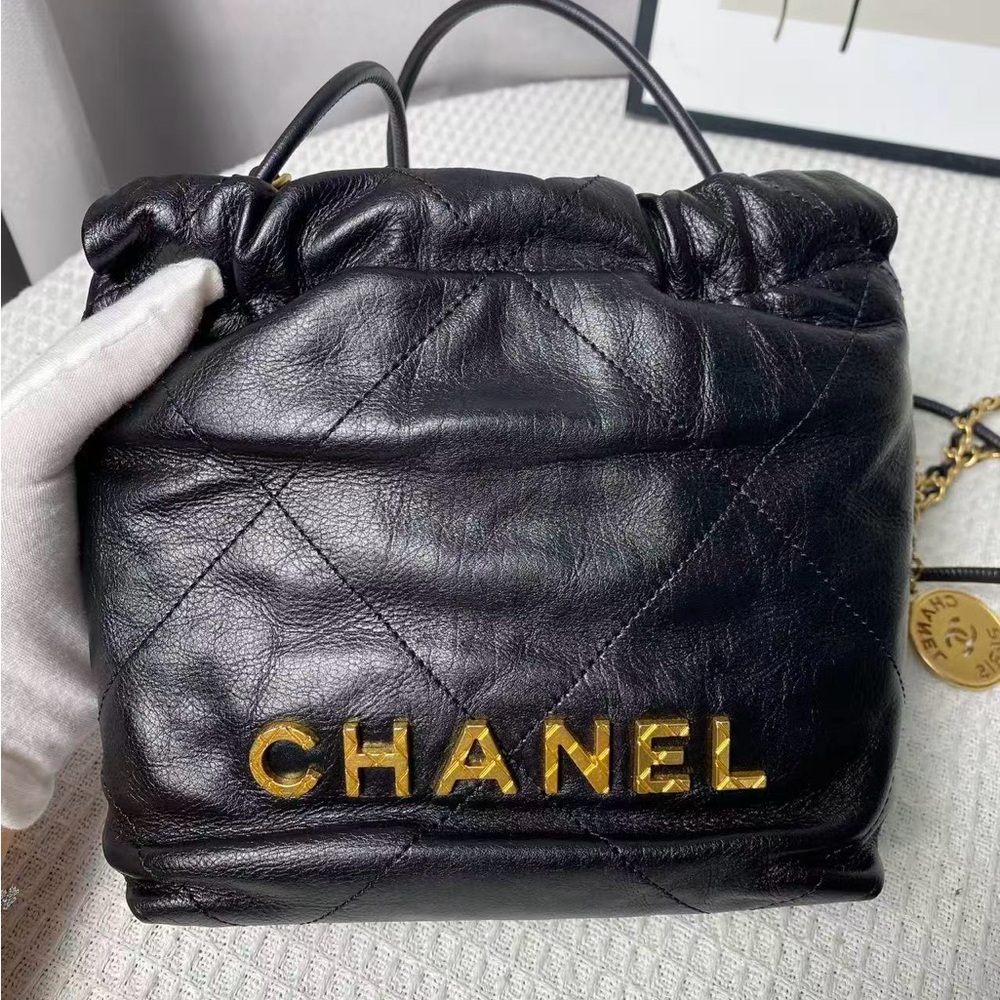 Chanel 22bag mini Black Leather Backpack with pearl chin